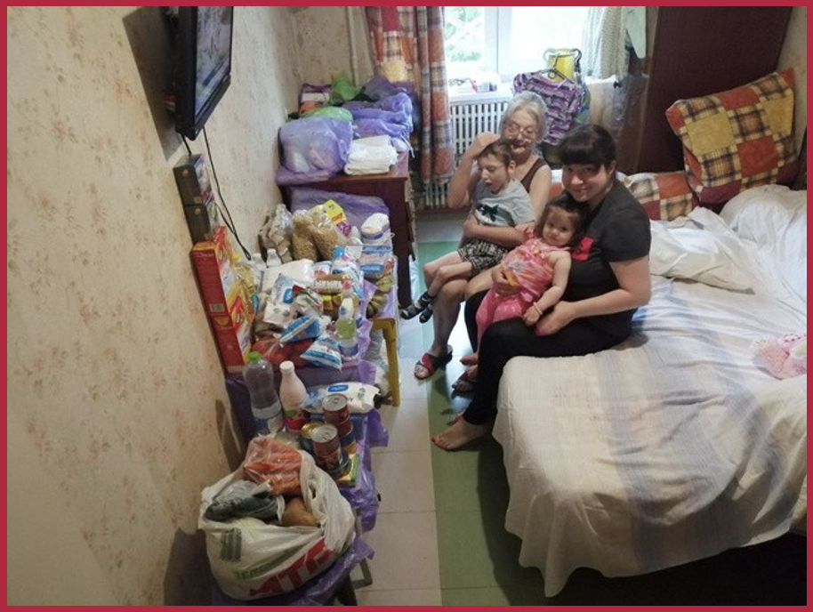 Kateryna and Mykyta with grandmother and sibling