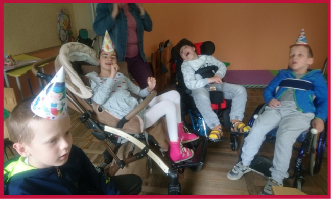 4 children with disabilities at party