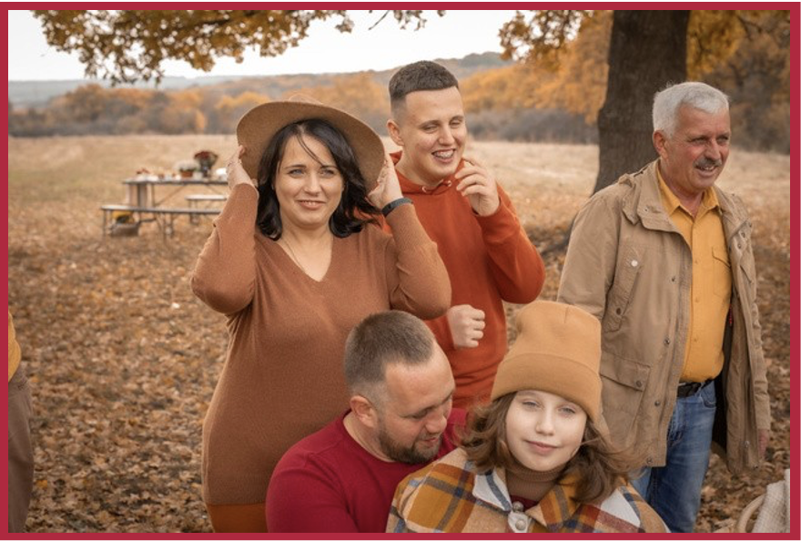 Liudmyla and Anna with family in portrait