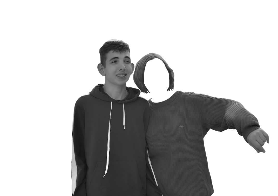 black and white photo of a teen boy and a woman standing arm in arm. The woman's face is cut out of the photo